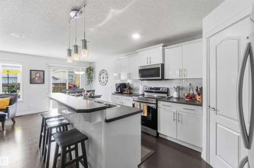 7 Catalina Court, Fort Saskatchewan, AB - Indoor Photo Showing Kitchen With Stainless Steel Kitchen With Double Sink With Upgraded Kitchen