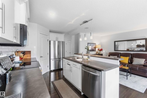 7 Catalina Court, Fort Saskatchewan, AB - Indoor Photo Showing Kitchen With Stainless Steel Kitchen With Double Sink With Upgraded Kitchen