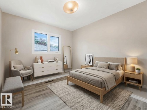 Wood-finish flooring, recessed lighting, and a window with white trim - 15916 88B Avenue Nw, Edmonton, AB 