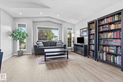Recessed lighting, light wood-finish flooring, multiple windows, and vaulted ceilings - 2109 37 Avenue Nw, Edmonton, AB 