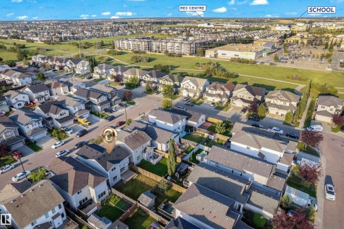 Residential neighborhood with single-family homes and multi-story buildings - 3003 25 Avenue Nw, Edmonton, AB 