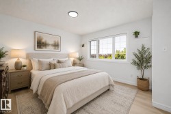 Bright room with light wood-finish flooring - 