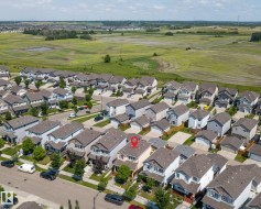 Residential community with paved streets and established homes - 
