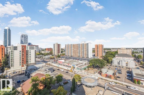 Expansive urban scenery featuring diverse architectural styles and a prominent city skyline - #1307 10045 117 St Nw, Edmonton, AB 