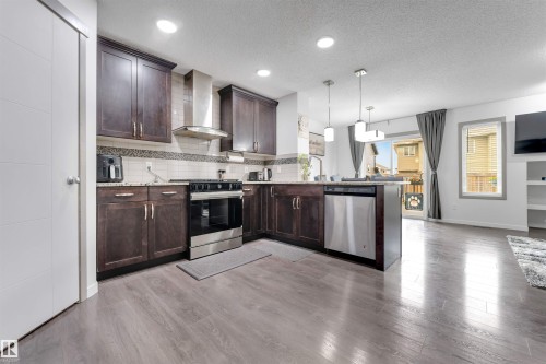 61 Springwood Way, Spruce Grove, AB - Indoor Photo Showing Kitchen With Stainless Steel Kitchen With Upgraded Kitchen