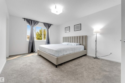 61 Springwood Way, Spruce Grove, AB - Indoor Photo Showing Bedroom