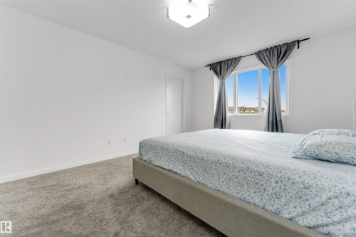 61 Springwood Way, Spruce Grove, AB - Indoor Photo Showing Bedroom