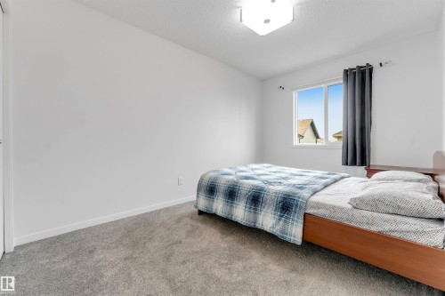 61 Springwood Way, Spruce Grove, AB - Indoor Photo Showing Bedroom