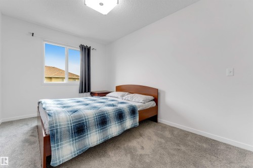 61 Springwood Way, Spruce Grove, AB - Indoor Photo Showing Bedroom