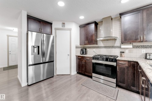 61 Springwood Way, Spruce Grove, AB - Indoor Photo Showing Kitchen With Stainless Steel Kitchen With Upgraded Kitchen