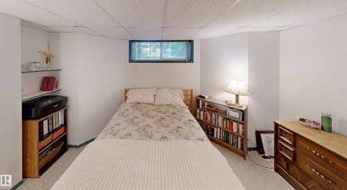 Built-in shelving and window create an inviting space - 10941 81 Avenue Nw, Edmonton, AB 