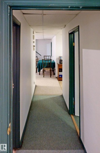 White walls and green-painted trim throughout - 10941 81 Avenue Nw, Edmonton, AB 