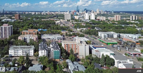 Dense urban landscape featuring multiple high-rise buildings and commercial structures - 10941 81 Avenue Nw, Edmonton, AB 