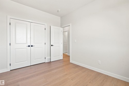 Wood-finish flooring throughout - 10462 104 Street, Morinville, AB 