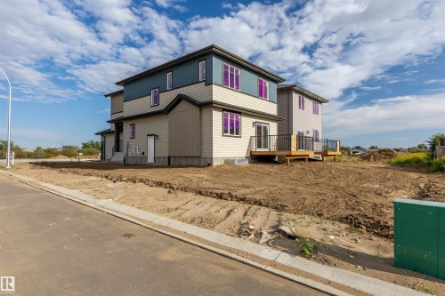 Modern two-story exterior with multi-toned siding - 10462 104 Street, Morinville, AB 