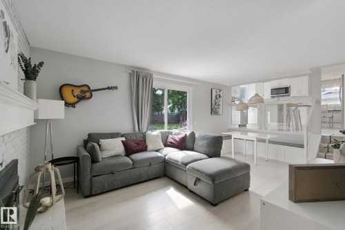 Light wood-finish flooring - 5 Labelle Crescent, St. Albert, AB 