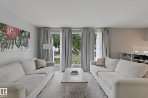 White textured ceiling, light gray wall paint, and white trim - 5 Labelle Crescent, St. Albert, AB 
