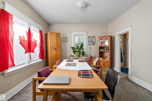 Wall-to-wall carpeting and neutral wall paint - 10816 92 Street Nw, Edmonton, AB 
