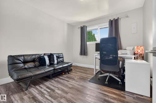 Recessed ceiling lighting, wood-finish flooring, and a window with natural light - 13512 111 Street Nw, Edmonton, AB 