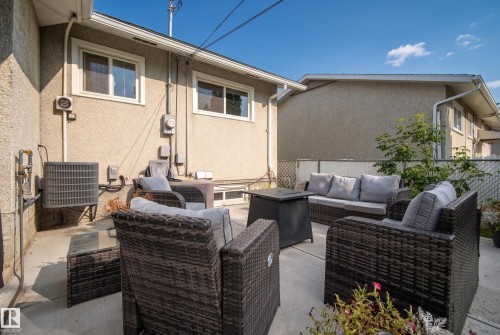 Concrete patio with a stucco exterior - 13512 111 Street Nw, Edmonton, AB 