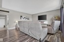 Wood-finish flooring with a neutral wall color - 13512 111 Street Nw, Edmonton, AB 
