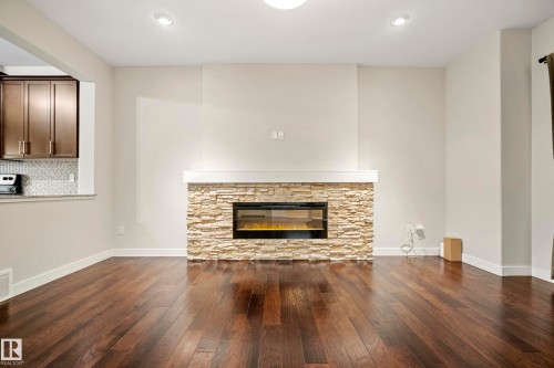 23 Greenbury Boulevard, Spruce Grove, AB - Indoor Photo Showing Living Room With Fireplace