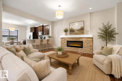 23 Greenbury Boulevard, Spruce Grove, AB - Indoor Photo Showing Living Room With Fireplace