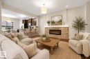 23 Greenbury Boulevard, Spruce Grove, AB  - Indoor Photo Showing Living Room With Fireplace 