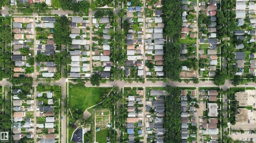 Aerial Survey. Displaying a residential area with varied property configurations and green spaces - 9124 119 Avenue Nw, Edmonton, AB - 