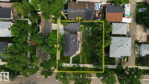 Aerial property view showcasing a rectangular lot measuring approximately 66' x 59' - 9124 119 Avenue Nw, Edmonton, AB - Outdoor