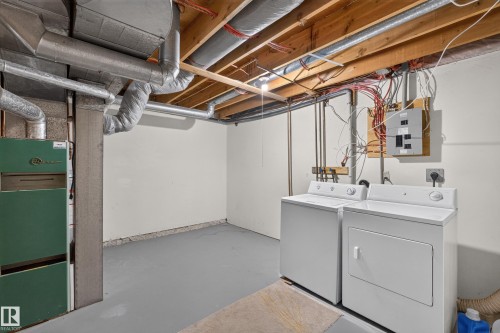 Painted concrete flooring and exposed ceiling joists - 17749 95 Street Nw, Edmonton, AB 