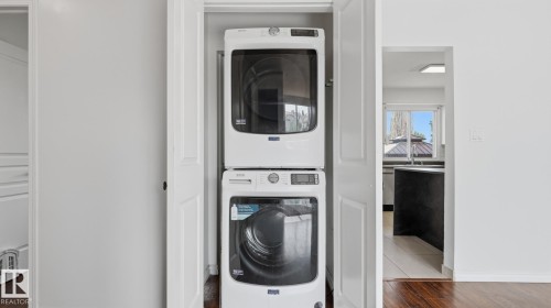Stackable washer and dryer within a dedicated closet - 12208 146 Avenue Nw, Edmonton, AB 