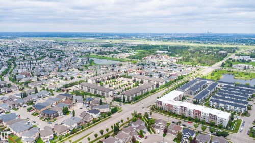 Expansive residential area featuring a mix of single-family homes and multi-family apartment buildings - 1608 65 Street Sw, Edmonton, AB - Outdoor With View