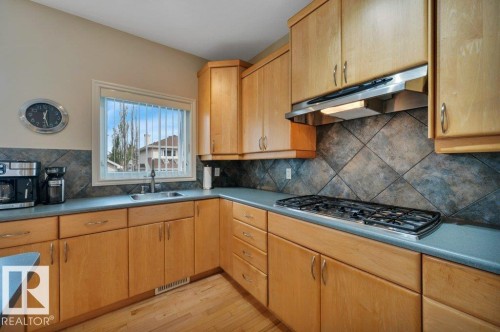 with built-in gas counter top stove - 739 Haliburton Crescent Nw, Edmonton, AB 