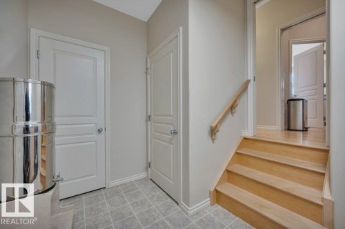 With doors leading to the garage and basement - 739 Haliburton Crescent Nw, Edmonton, AB 