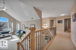overlooking the bonus room leading to the bedrooms - 