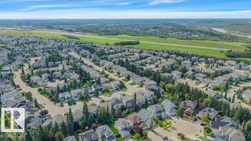 Expansive residential development featuring mature landscaping and a river visible in the distance - 739 Haliburton Crescent Nw, Edmonton, AB 