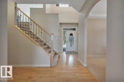 with staircase leading upstairs - 