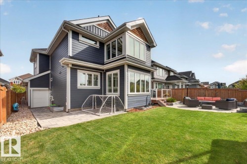 Oversized triple garage could fit 4-5 vehicles and convenient overhead door to bring kayaks & sup to the lake - 2032 90 Street Sw, Edmonton, AB 