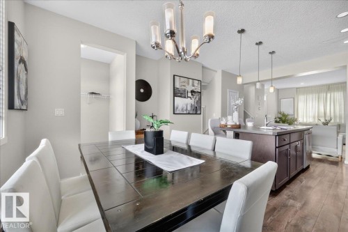 Open-concept interior with wood-finish flooring - 2046 Chalmers Way Sw, Edmonton, AB 