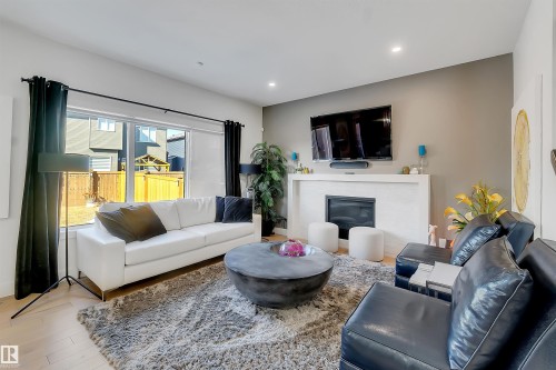 1399 Watt Drive Sw, Edmonton, AB - Indoor Photo Showing Living Room With Fireplace