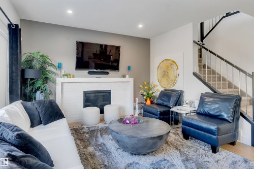1399 Watt Drive Sw, Edmonton, AB - Indoor Photo Showing Living Room With Fireplace
