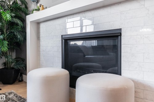 1399 Watt Drive Sw, Edmonton, AB - Indoor Photo Showing Other Room With Fireplace