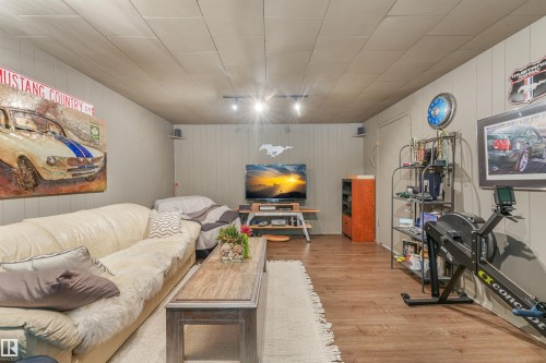 4708 Malmo Road Nw, Edmonton, AB - Indoor Photo Showing Gym Room