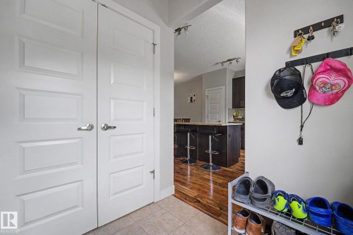 Entryway featuring tiled flooring and a pair of paneled doors - 3343 Weidle Way Sw, Edmonton, AB 
