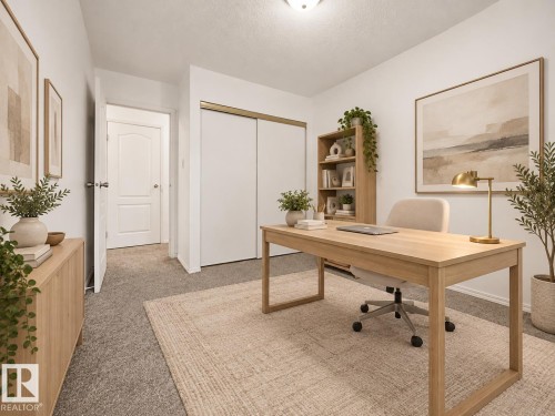 Neutral wall color, wall-to-wall carpeting, white interior doors, and closet with sliding doors - #119 3611 145 Av Nw, Edmonton, AB 