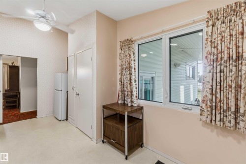 Dual-pane window, wall-mounted ceiling fan, two built-in storage closets - 9311 68 Street Nw, Edmonton, AB 