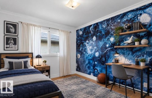 Accent wall featuring a deep blue abstract pattern - 7304 98A Avenue Nw, Edmonton, AB 
