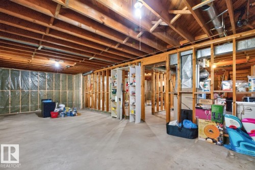 Exposed ceiling joists and wood framing - 7304 98A Avenue Nw, Edmonton, AB 