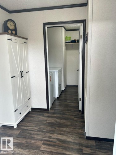 Wood-finish flooring throughout - 63 Willow Park Estates, Leduc, AB 